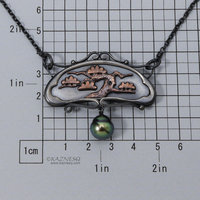 Art Nouveau style pine tree motif necklace with a black pearl