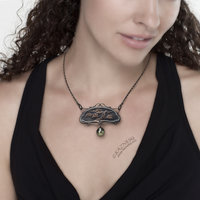 Art Nouveau style pine tree motif necklace with a black pearl