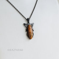 (C) KAZNESQ: Art Nouveau style Long Oval Rutilated Quartz oxidized silver pendan