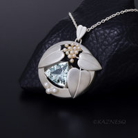 Blue Topaz and Freshwater Pearls matte finished silver leaf pendant necklace