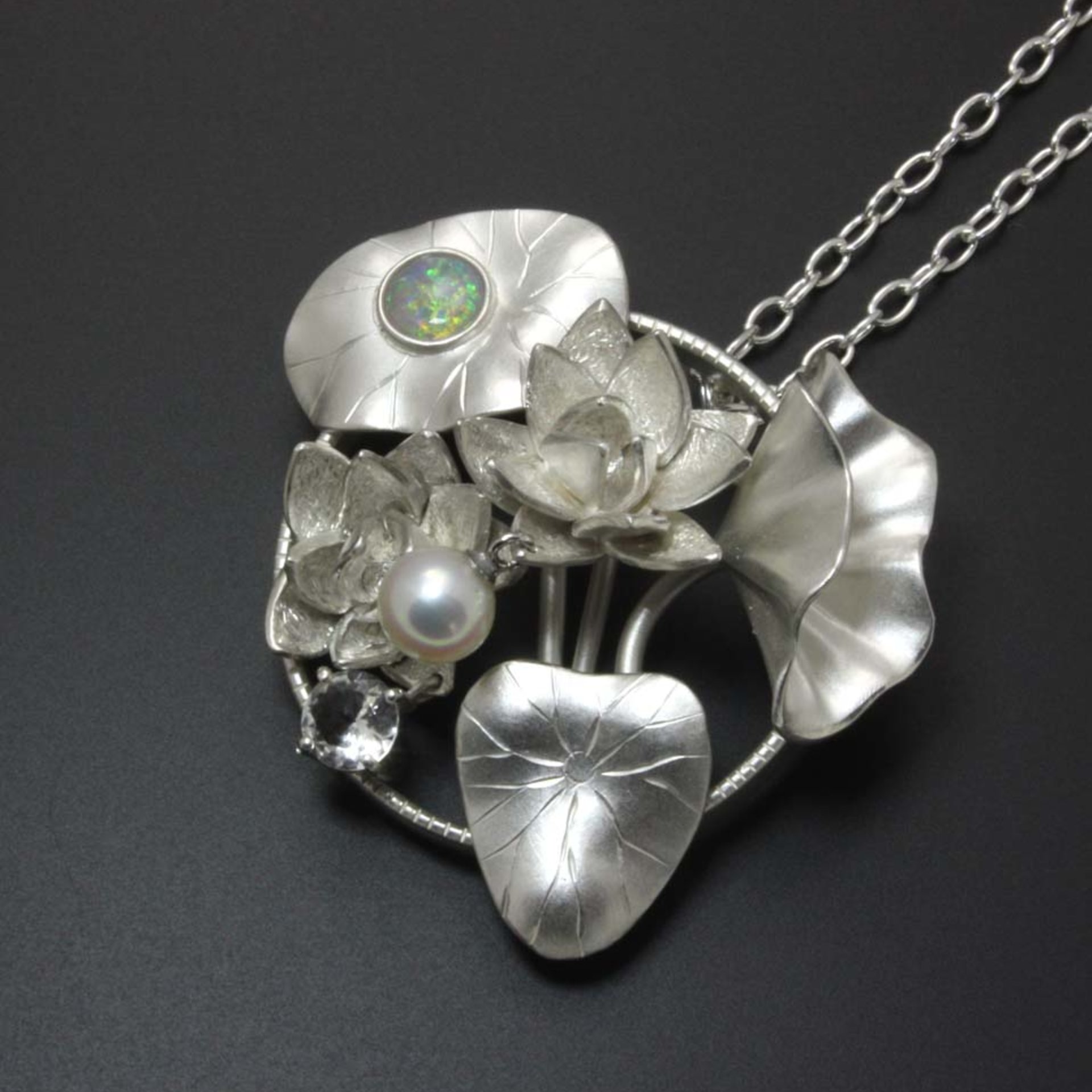 Lotus pendant, silver pendant with opal, quartz, and cultured pearl.