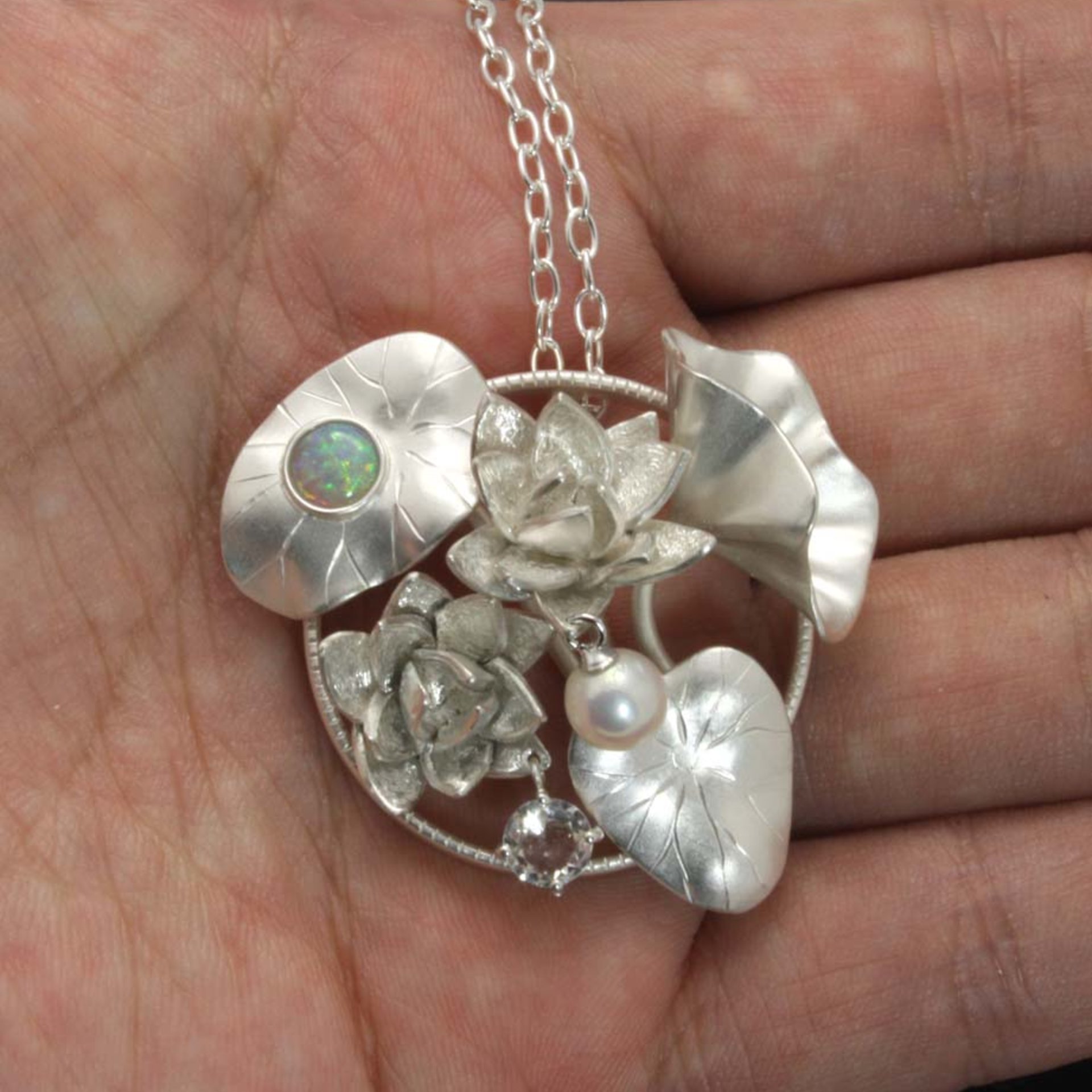 Lotus pendant, silver pendant with opal, quartz, and cultured pearl.