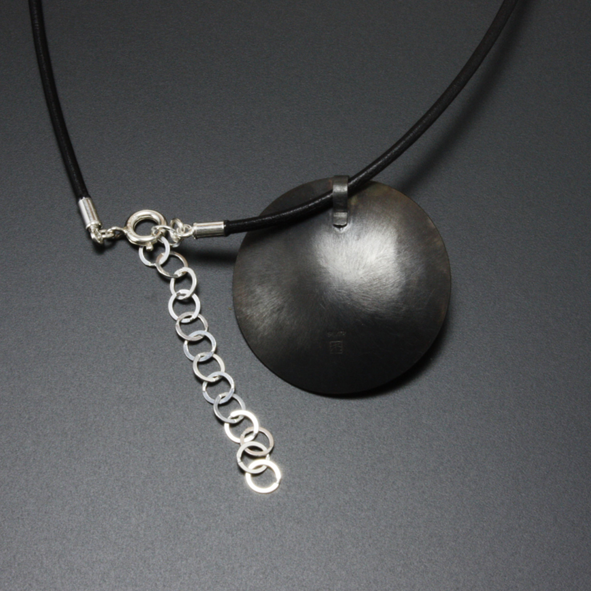 Round Keum Boo oxidized silver pendant necklace of falling plum blossoms with Ak