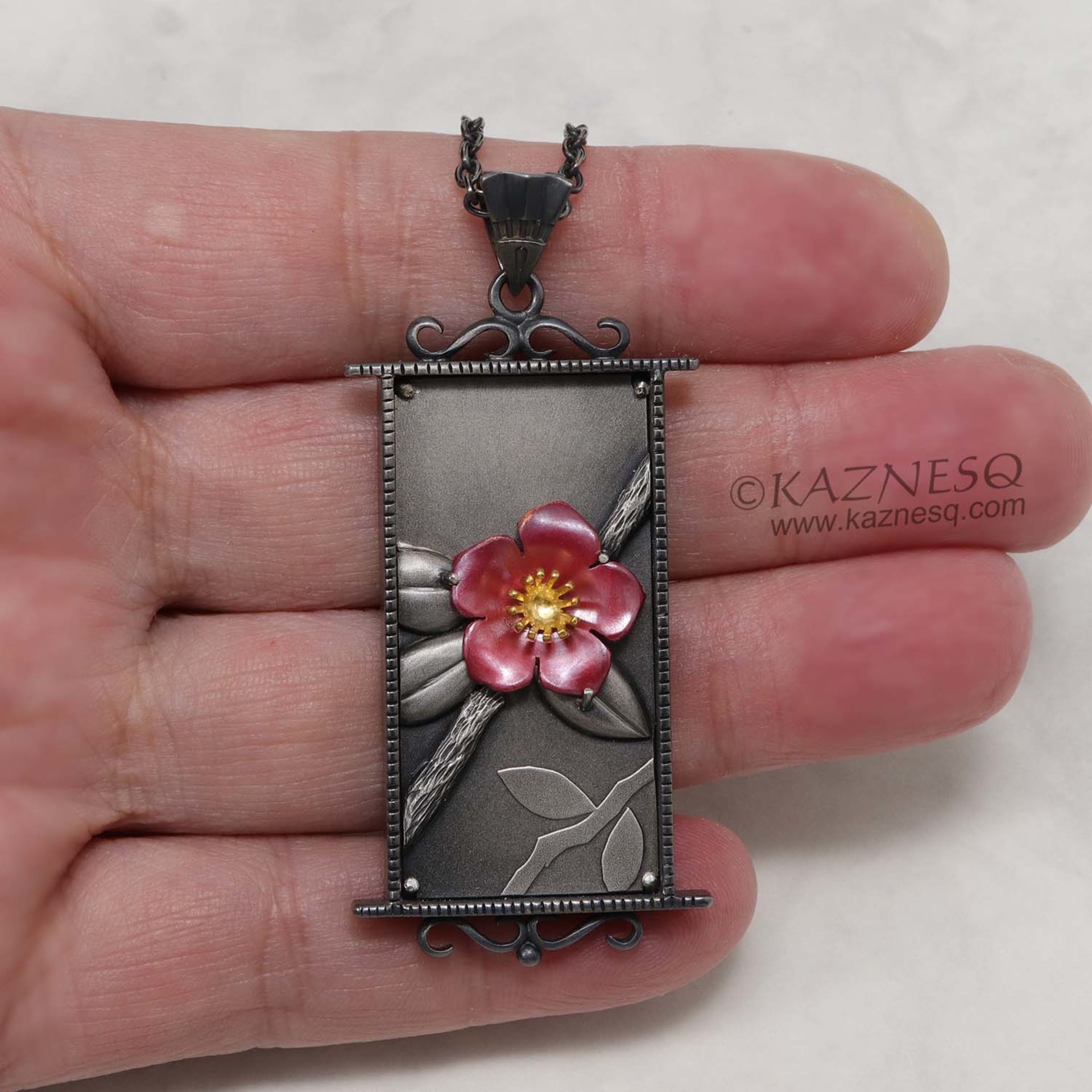 (C) KAZNESQ: Camellia pendant necklace of heat patinaed copper and silver