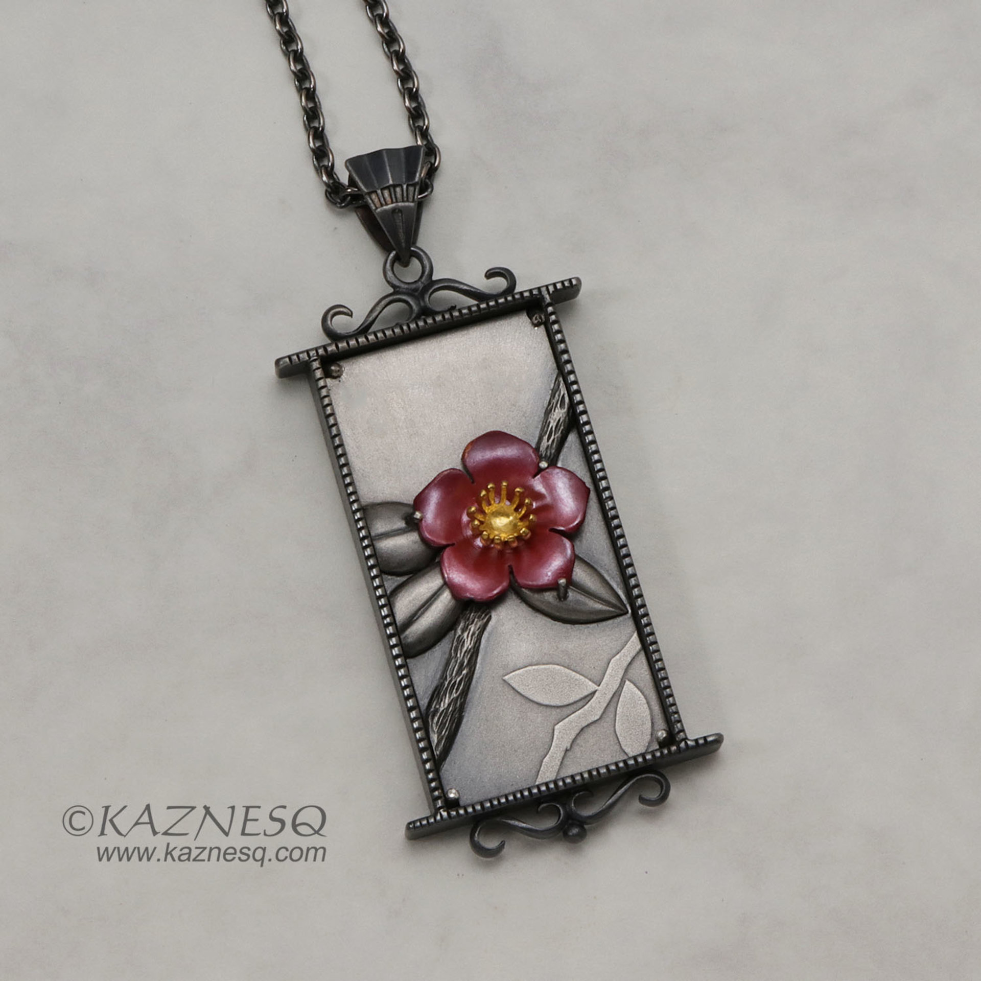 (C) KAZNESQ: Camellia pendant necklace of heat patinaed copper and silver