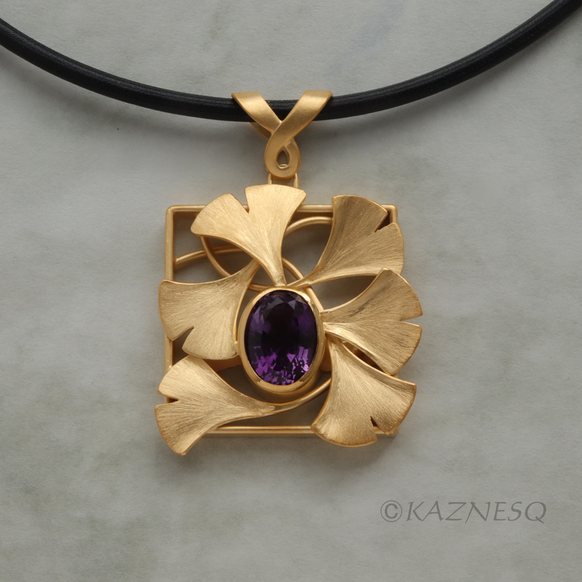 (C) KAZNESQ: Ginkgo gold tone silver square necklace with amethyst