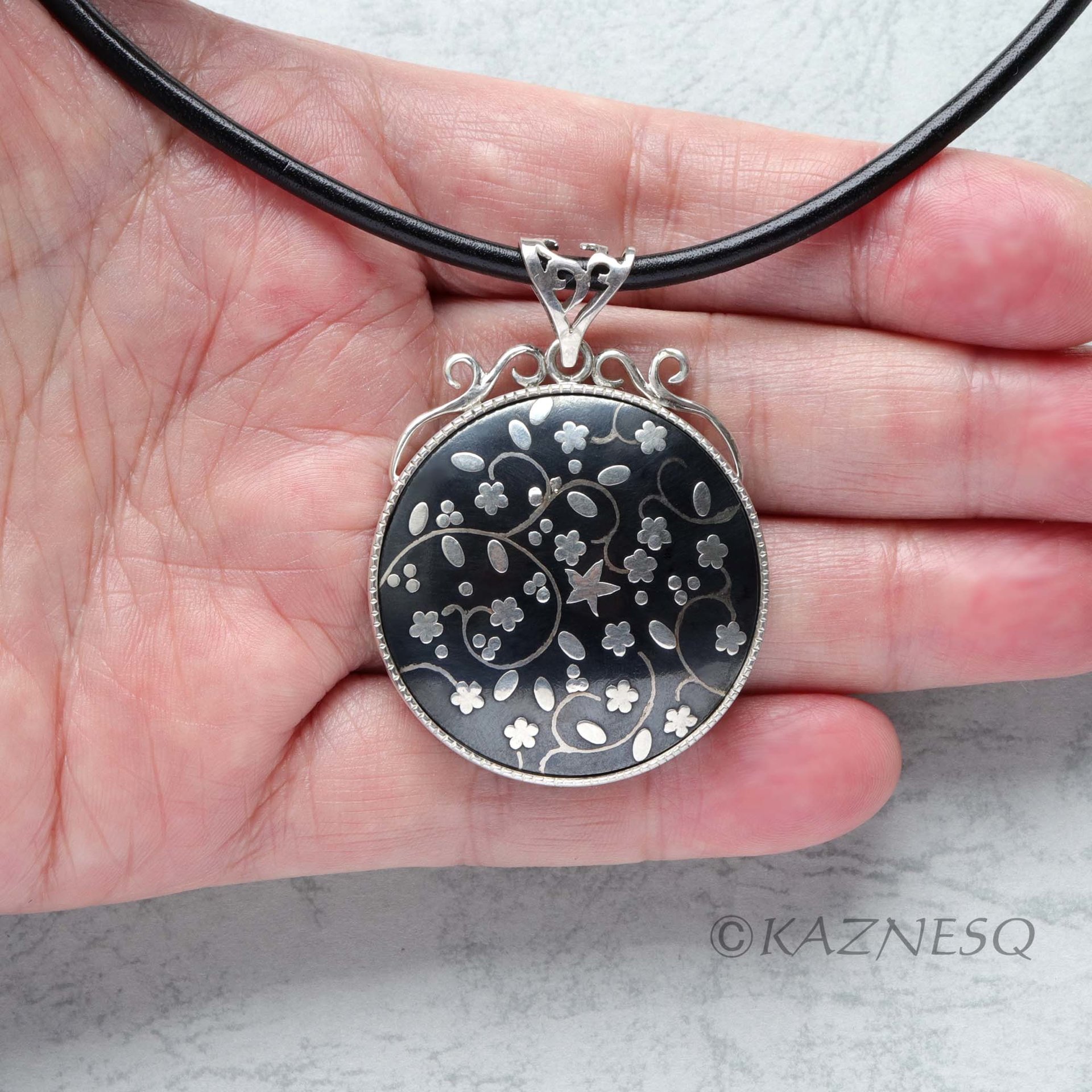(C)KAZNESQ: Black copper and silver flower necklace