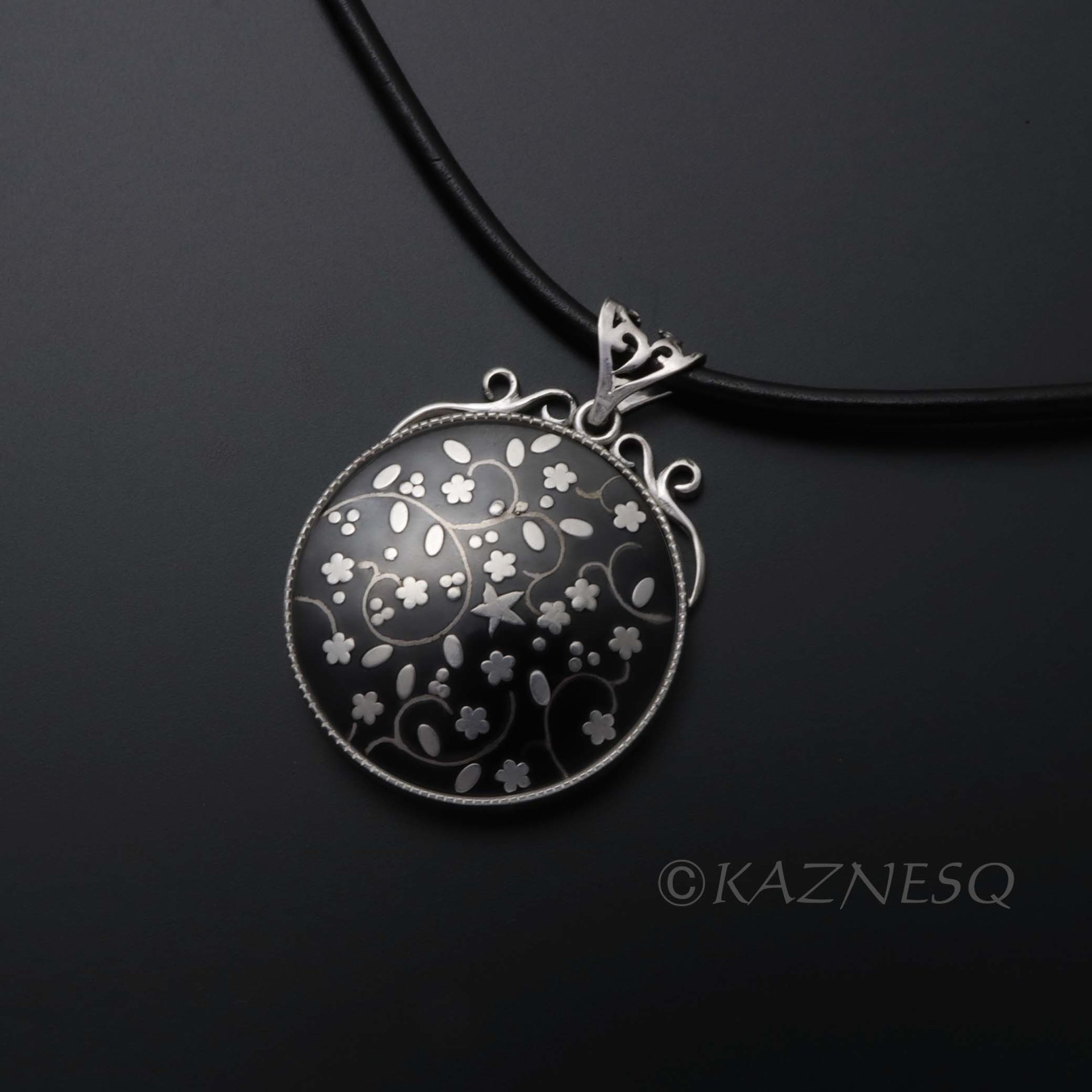 (C)KAZNESQ: Black copper and silver flower necklace