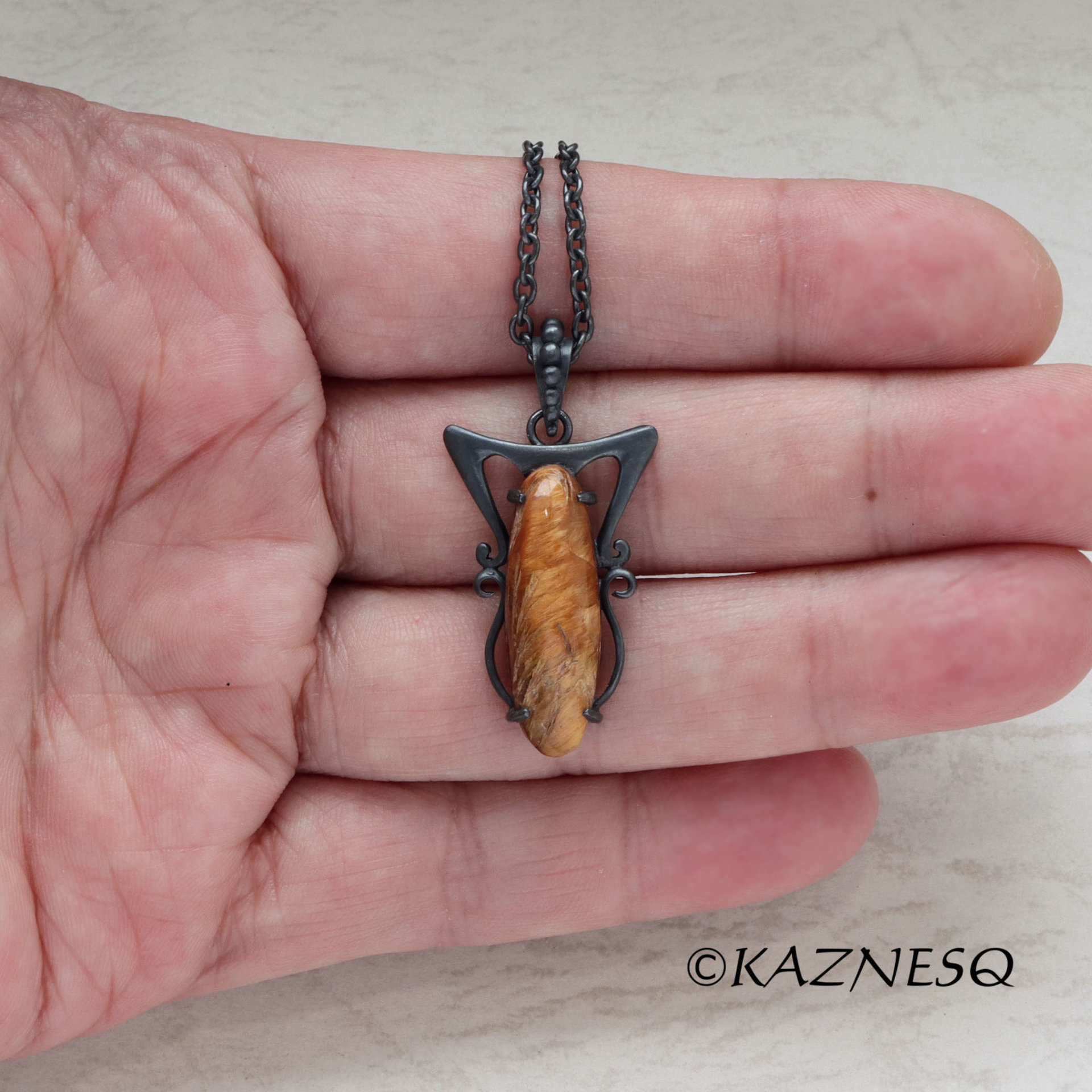 (C) KAZNESQ: Art Nouveau style Long Oval Rutilated Quartz oxidized silver pendan