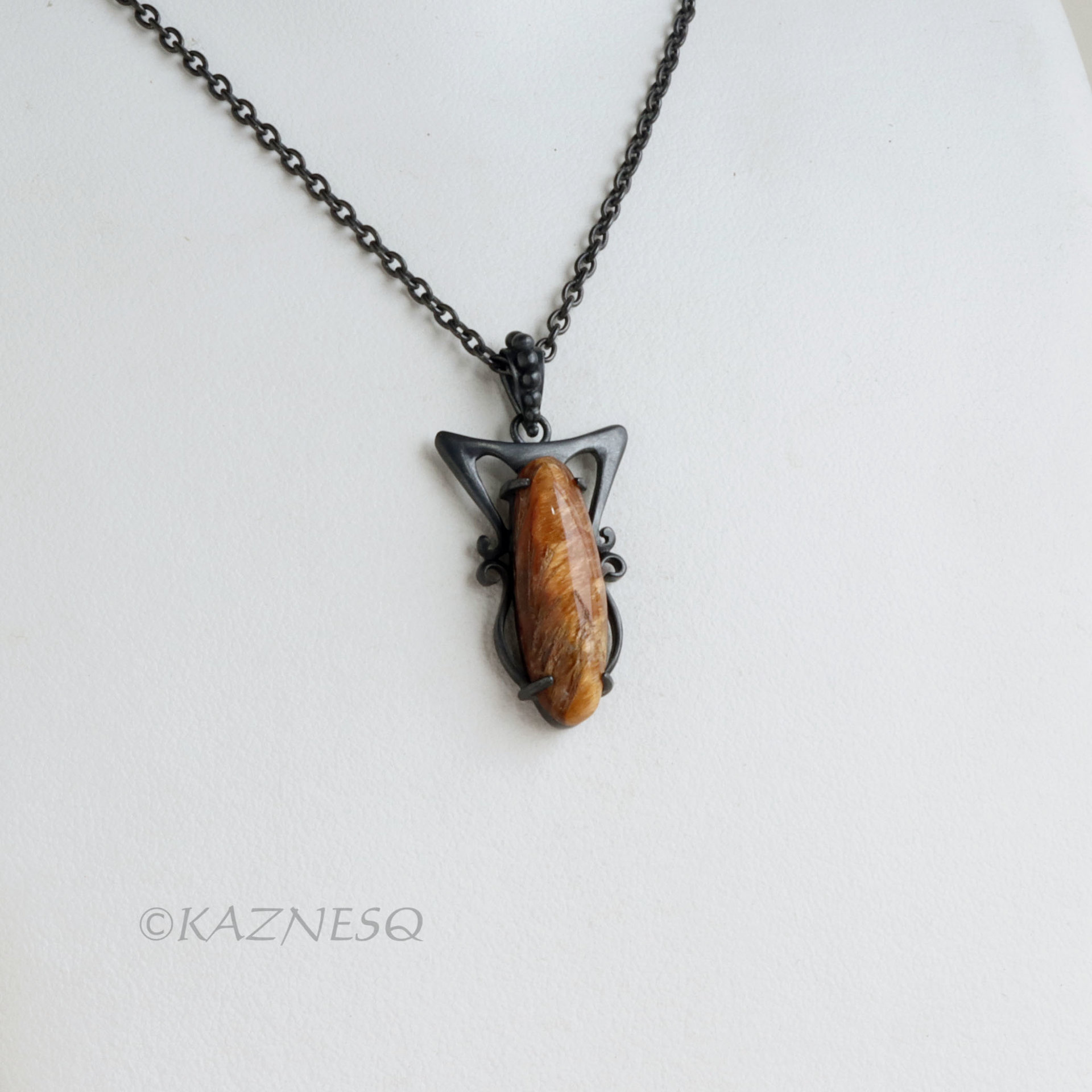 (C) KAZNESQ: Art Nouveau style Long Oval Rutilated Quartz oxidized silver pendan