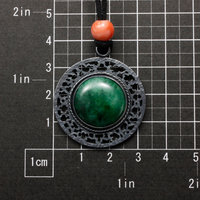 (C) KAZNESQ: Jadeite round oriental open work pendant