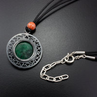 (C) KAZNESQ: Jadeite round oriental open work pendant