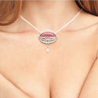 Pink stone oval silver pendant with pearls
