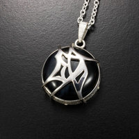 SOLD: Tribal design Chinese character"Accomplishment" silver pendant with a Hawk's Eye