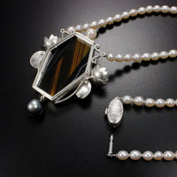 Lotus open work tiger's eye necklace