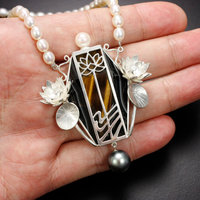 Lotus open work tiger's eye necklace