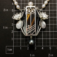 Lotus open work tiger's eye necklace