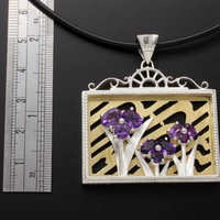 (C) KAZNESQ: Iris pendant featuring amethyst