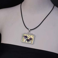 (C) KAZNESQ: Iris pendant featuring amethyst