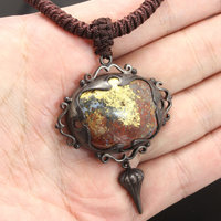 SOLD: Gold foil applied stone and Japanese patinaed sterling pendant