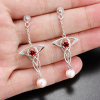 SOLD: Art Nouveau style earrings with vivid red sapphire