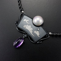 SOLD: The moon and the morning star necklace with a mabe, a diamond, and amethysts.