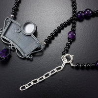 SOLD: The moon and the morning star necklace with a mabe, a diamond, and amethysts.