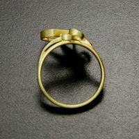 Arch and scroll 18K gold ring with a diamond