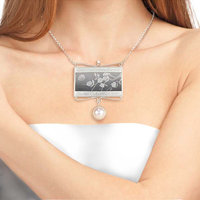 SOLD: Keum Boo silver necklace of the moon and blossoms motif