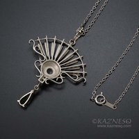 On Sale: Green tourmaline, hematite, fan motif silver pendant