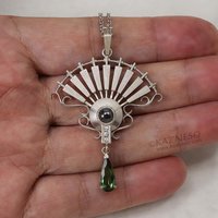 On Sale: Green tourmaline, hematite, fan motif silver pendant
