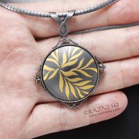 (C) KAZNESQ: Thriving leaves round Keum Boo pendant