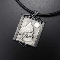 The moon and a pine tree silver pendant