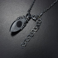 SOLD: Rutilated quartz pendant, oxidized silver pendant necklace, black mother of pearl lined quartz