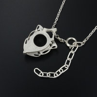 This Art Nouveau style pendant necklace is made of a black tourmaline cab and st