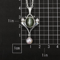 Catseye pendant necklace. silver pendant necklace, green actinolite and akoya pe