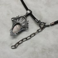 Golden rutilated quartz with iridescent colors Art Deco silver pendant necklace