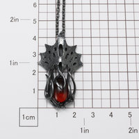 Art Nouveau style tentacles pendant necklace with garnet.