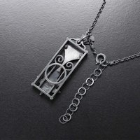 Ginkgo and maple leaf pendant necklace in Art Deco style