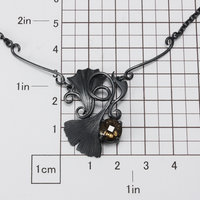 Gothic style Ginkgo necklace of oxidized silver and brown quartz