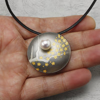 Round Keum Boo oxidized silver pendant necklace of falling plum blossoms with Ak