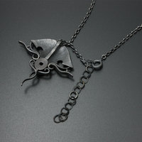 Black star sapphire steampunk silver and gold necklace