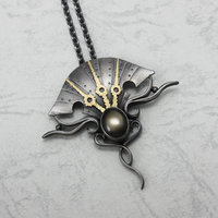 Black star sapphire steampunk silver and gold necklace