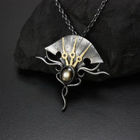 Black star sapphire steampunk silver and gold necklace
