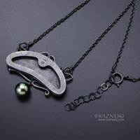 Art Nouveau style pine tree motif necklace with a black pearl