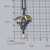 Lavender spinel Art Nouveau style oxidized silver pendant with a freshwater pear