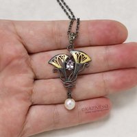 Lavender spinel Art Nouveau style oxidized silver pendant with a freshwater pear