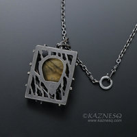 (C) KAZNESQ: Yellow labradorite trapped in a bush goth oxidized silver pendant