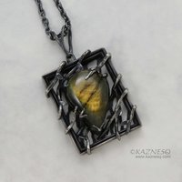 (C) KAZNESQ: Yellow labradorite trapped in a bush goth oxidized silver pendant