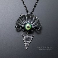 The moon on the ocean and Venus pendant, Black south sea pearl and a diamond oxi